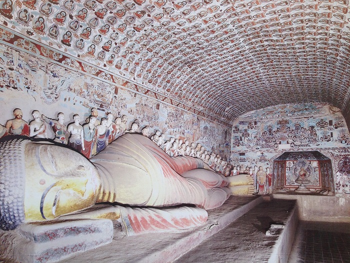 A 55-foot reclining Buddha statue from the Tang period rests in Cave 148 of the Mogao Caves. Krister Blomberg/Wikimedia Commons 