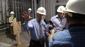 NMAH Director John L. Gray leads the hard-hat tour of the construction zone. 